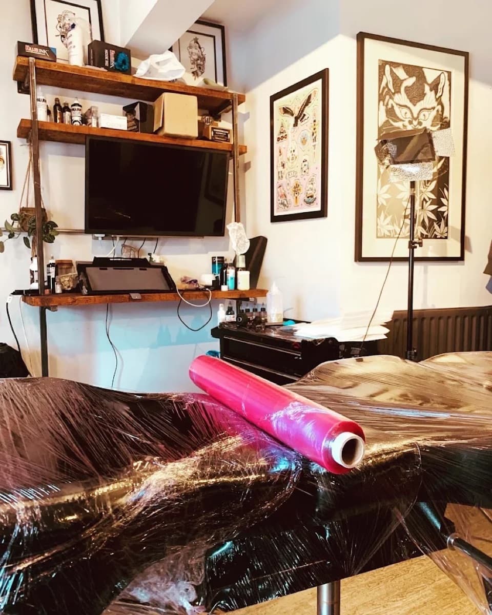 A tattoo studio workstation prepared and covered before a session